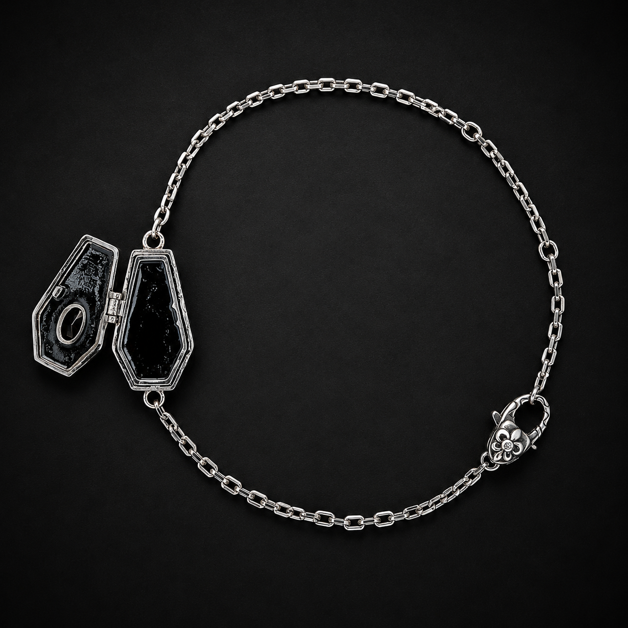 Open coffin compartment detail on sterling silver bracelet